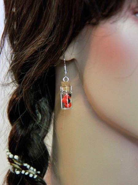 Huayruro earrings Inca